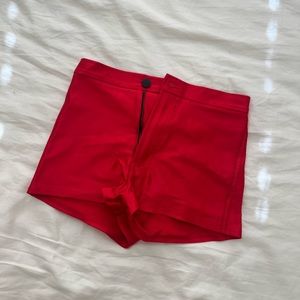 American apparel disco shorts in red- size small. Worn once.